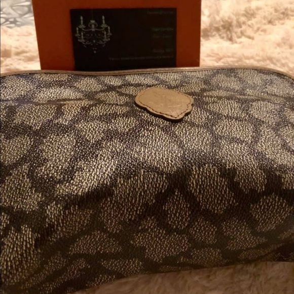 Amazon.com : Yves Saint Laurent YSL Cosmetic Pink Snap Pouch  Saint Laurent cosmetic bag
